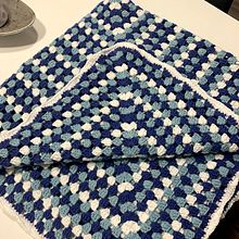 Manta bebé a crochet. Un proyecto de Diseño de complementos de Jennifer Calvo Burgos - 11.11.2021