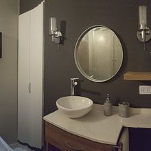 Remodelación de un baño y cocina, en una casa de más de 100 años construida con ladrillos de barro, en este caso, los clientes querían modernizar los ambientes.. Un proyecto de Diseño de Costanza Borzomí - 10.02.2022