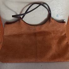 Mi proyecto del curso: Creación de bolsos de cuero artesanales para principiantes. Design, Accessor, Design, Arts, Crafts, and Sewing project by Ilda Karina Nievas - 07.20.2022