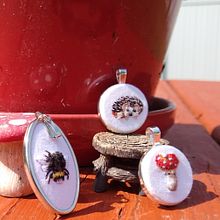 My project for course: Miniature Needlework: Make Embroidered Jewelry. Jewelr, Design, Embroider, and Textile Design project by jenniferann2211 - 05.06.2023
