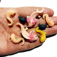 Axolotes en arcilla polimérica. Accessor, Design, Jewelr, Design, and Ceramics project by Anabel Lee - 08.21.2022