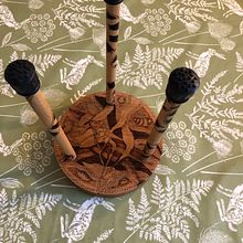 A burnt tongue drum stand, with pyrography on every surface.. Arts, and Crafts project by Yvonne Rowland - 09.19.2023