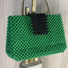 Beaded Bags. Un projet de St, lisme , et Artisanat de Anointing Lukola - 27.09.2023