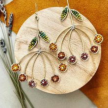 Sunset Tansies. Een project van DIY y Sieradenontwerp van intheembersbeads - 02.02.2024