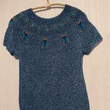 Mi proyecto del curso: Diseño y tejido de punto con mostacillas de colores. Een project van Ontwerp van accessoires, Textiel, Breien y Textielontwerp van Paqui González Quintero - 23.05.2024