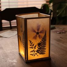 Teabag floral lantern. Un proyecto de Artesanía de Sibia Torres Padilla - 01.02.2024