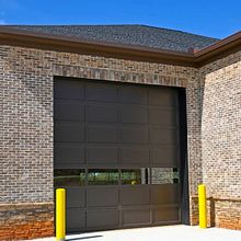 Commercial Garage Door Installation in Aurora, CO. Business project by Pops Garage - 12.30.1999