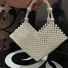 My project for course: Design and Creation of Beaded Bags. Design, Accessor, Design, Arts, Crafts, Fashion Design, and Fiber Arts project by Khushi Makkar - 07.17.2024