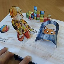 Pop-up book about a girl and her orange cat. Projekt z dziedziny Craft, Grafika ed, torska,  Introligatorstwo, Papercraft i Ilustracje dla dzieci użytkownika Lian - 01.01.2025