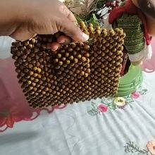 Bolso de cuentas demadera. Projekt z dziedziny Projektowanie dodatków, Design, Projektowanie mod i  Tkactwo użytkownika Luz Deicy Garces Montano - 11.01.2025