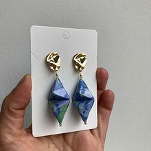 Aros de Origami. Accessor, Design, Arts, Crafts, DIY, Fashion Design, Jewelr, Design, and Paper Craft project by valeria.perez.c92 - 04.12.2025