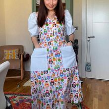 a cute dress with matryoshka doll print. Un proyecto de Costura, Diseño de moda, DIY, Patronaje y confección			 de Ezgi Arıncı - 07.05.2026