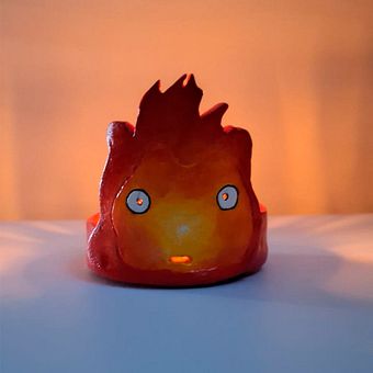 Calcifer Porta-Velas. Un proyecto de Cerámica, Pintura acrílica y Artesanía de Laryssa Ferreira - 19.06.2025