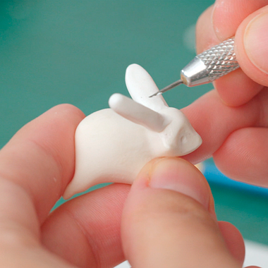 Como colar peças cruas de polymer clay a partes já cozidas