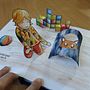 Pop-up book about a girl and her orange cat. Arts, Crafts, Editorial Design, Bookbinding, Paper Craft, and Children's Illustration project by Lian - 01.01.2025
