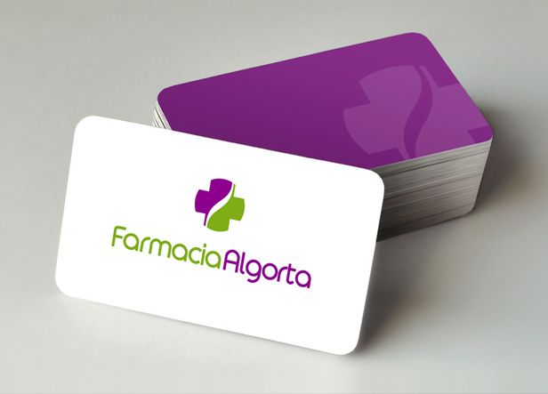 Algorta es el nombre de una farmacia ubicada en Madrid. El logo definitivo combina sutilmente la cruz y el icono de la serpiente. -1