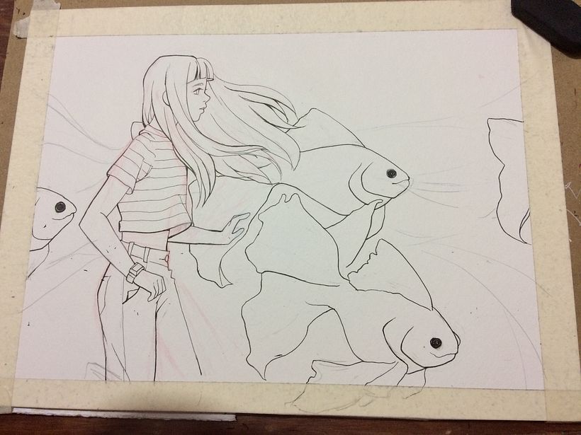 2. Trazando los peces con estilógrafos. Añadí un margen con cinta masking tape, éste será retirado al final del proceso.