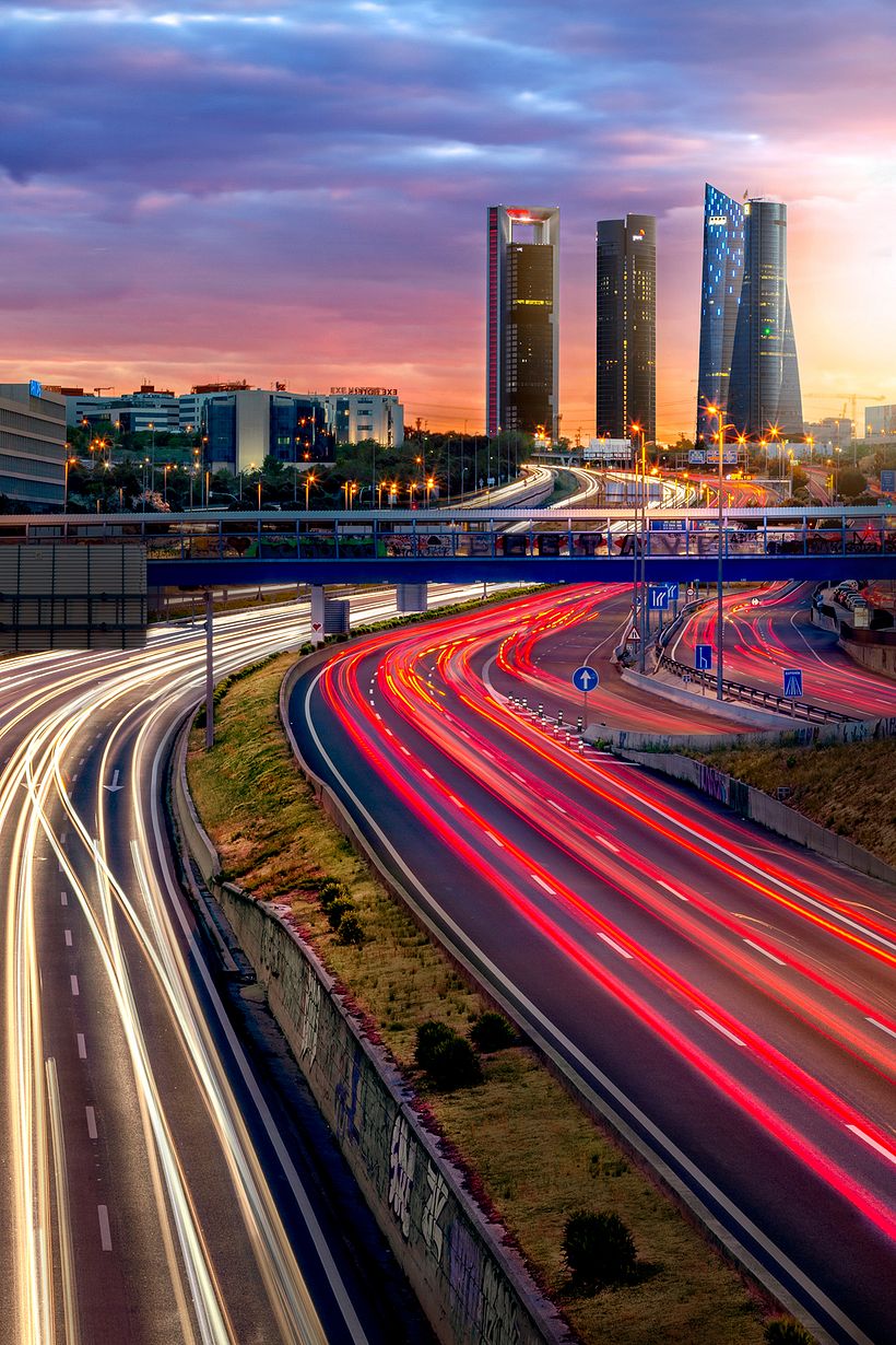 Composite image of 8 photographs with different lights, from sunset to night lights