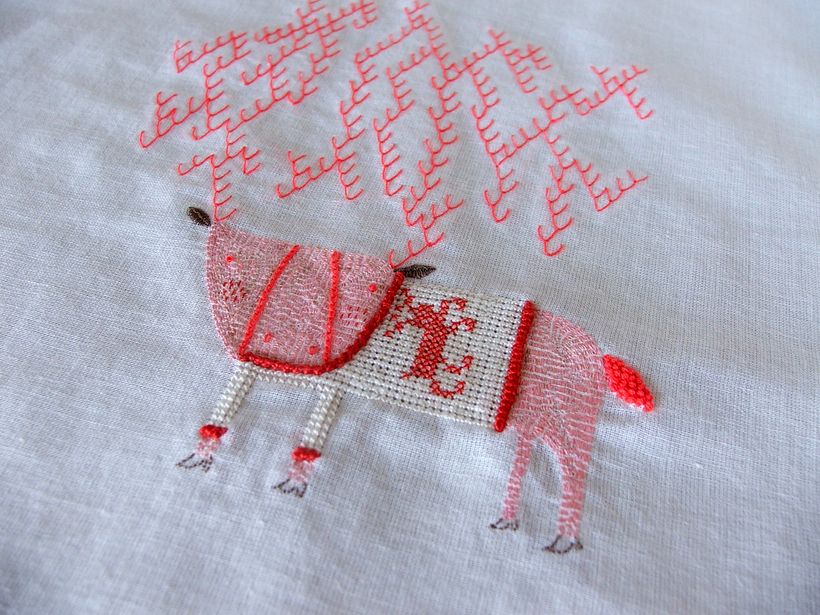 Reno con sweater de reno