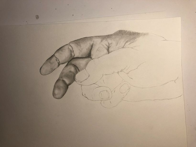Continuo con los oscuros y el volumen. Termino de dibujar la mano.