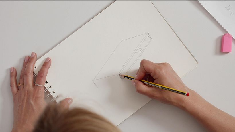 Sketch the top part of the desk