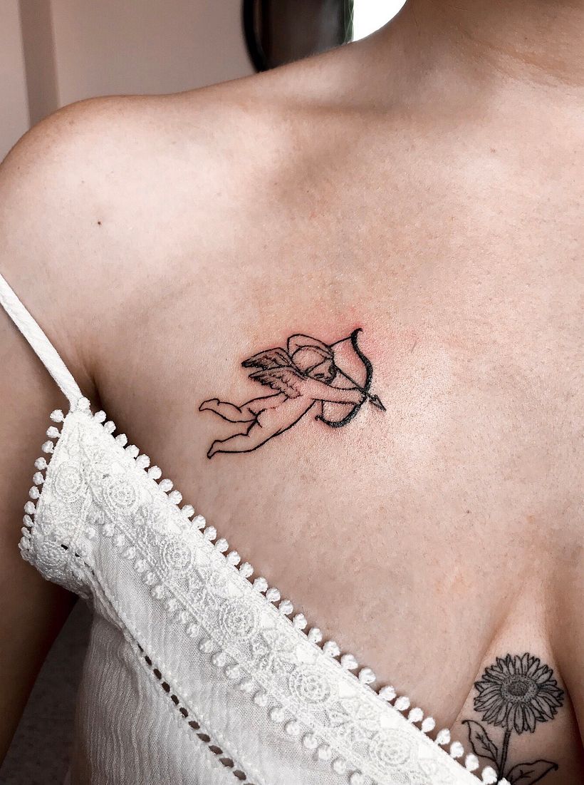 Foto del auto tatuaje que me hice de un querubín. 