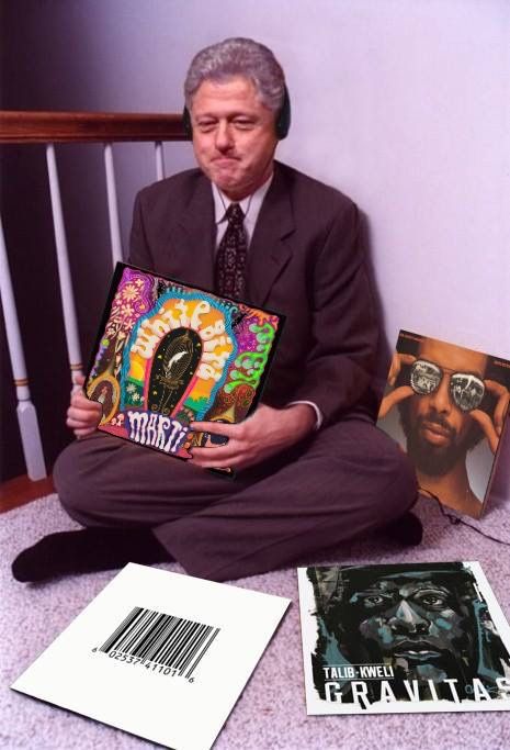Former President Clinton Jams to the Tune while he models the record jacket for me