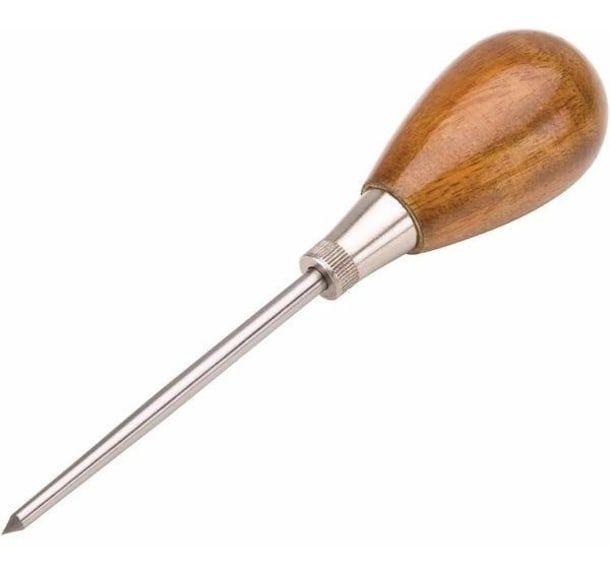 Punção é um metal com uma ponta fina que você usará para perfurar