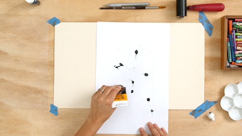 Apply the ink to the back of the sheet with the sketch