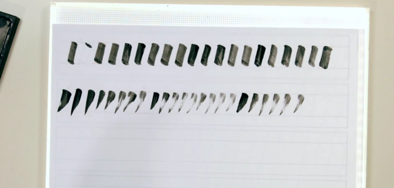Simple strokes in the upper part, flicks in the lower part