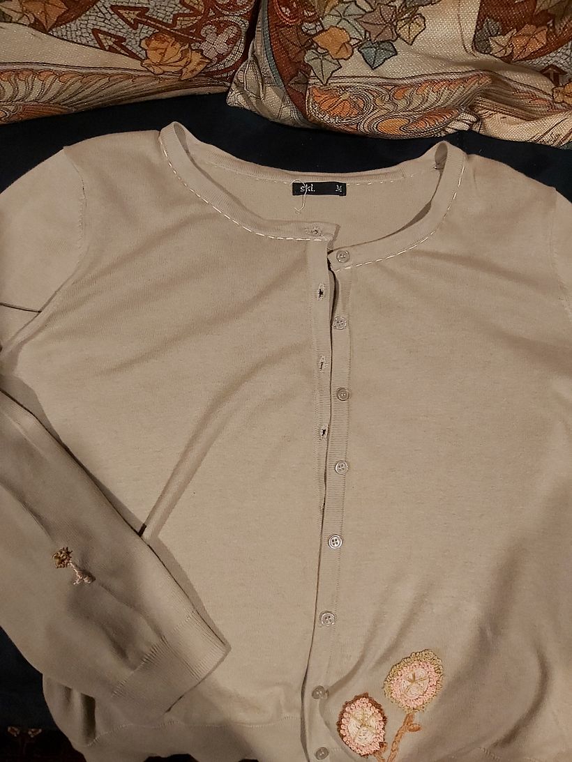 Saving a moth eaten cardigan.couldn't.Visible mending.