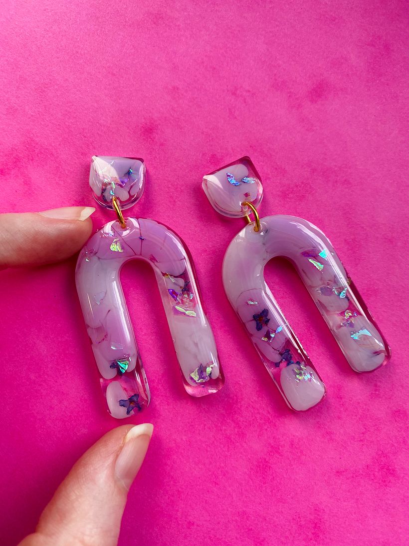 Self dried Buddleia flowers, glitters and pigments in clear resin.