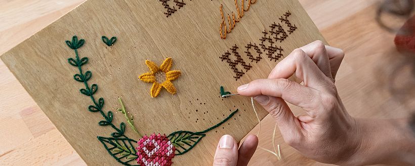 L'Abu Studios, cross-stitch embroidery on wood