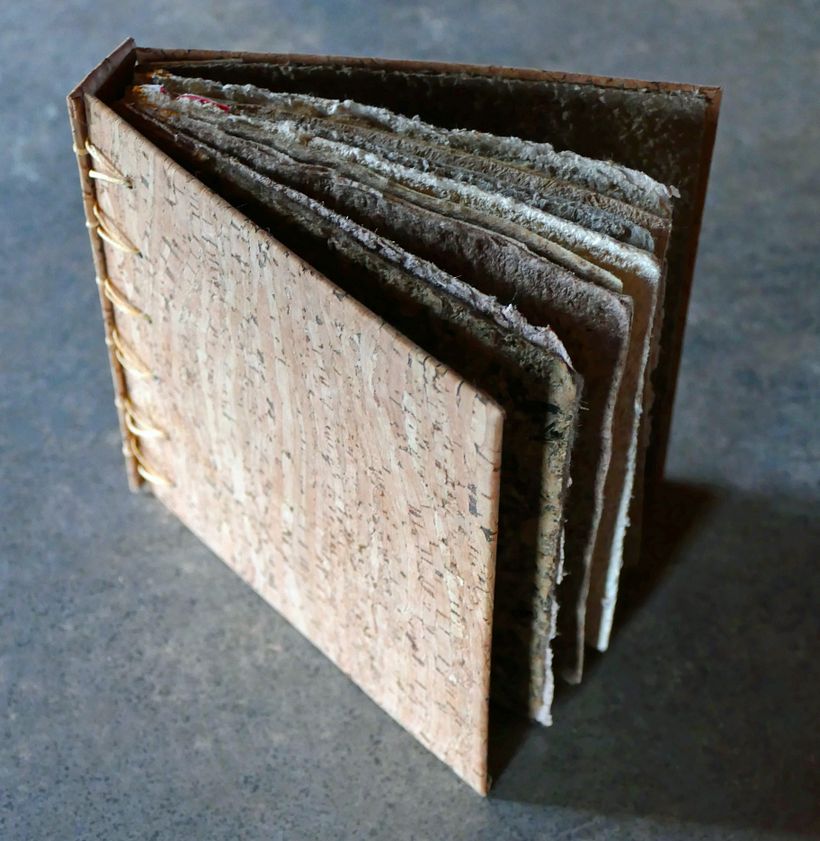 text pages are a variety of handmade papers that do not lend themselves to folding