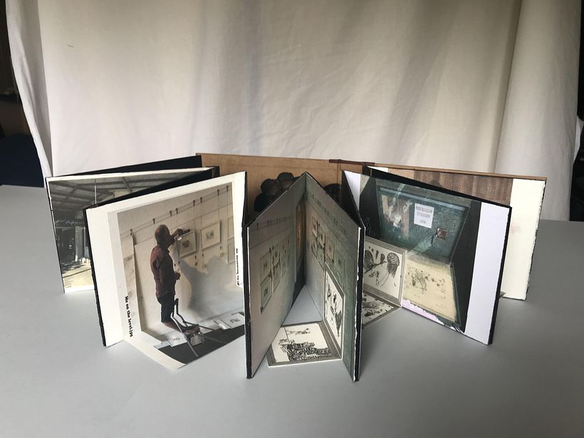 Some scenes from setting up art exhibition with fold out pieces