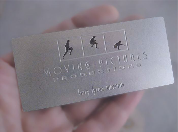 metal business card design for Moving Pictures Productions (contact info on reverse side)