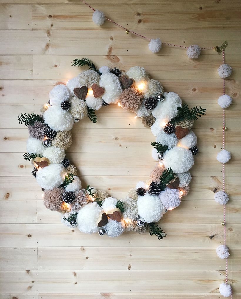 This wreath is over 60cm wide and has a string of lights incorporated in it too! 