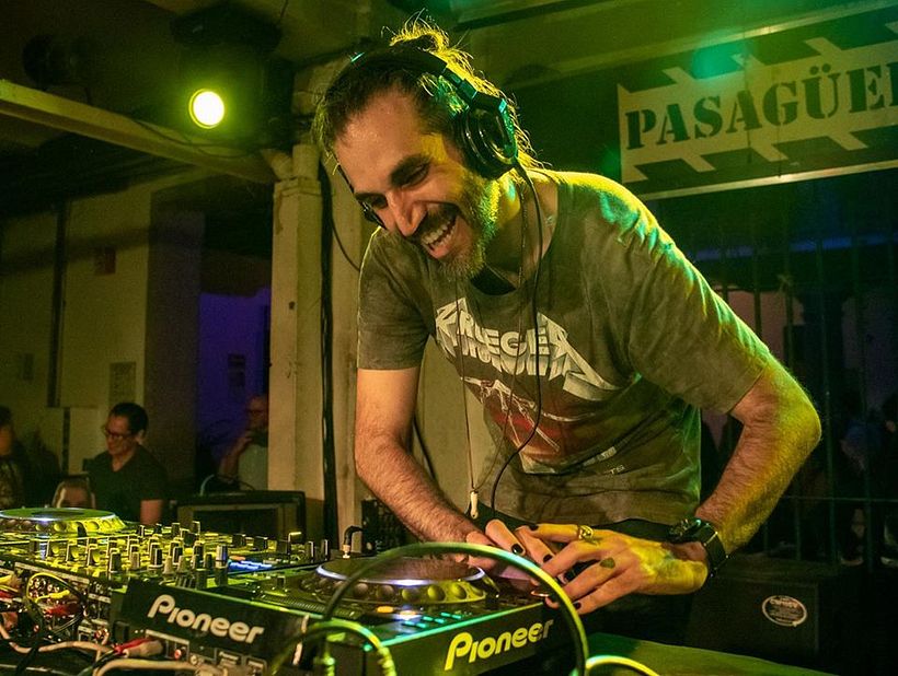 Chuck Pereda at the decks during a party