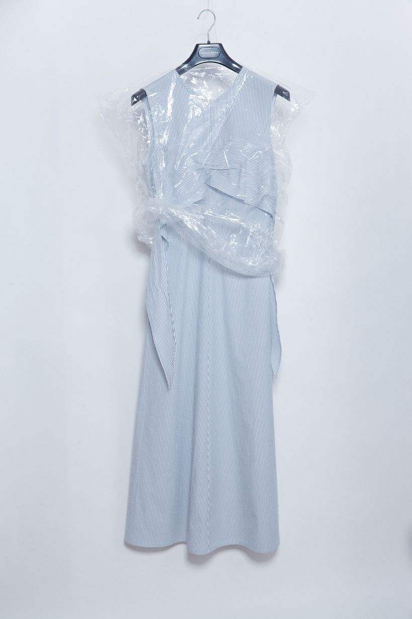 Striped dress before taking photos for e-commerce