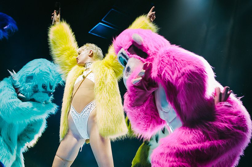 Miley with "The Boys" a blue bulldog and a pink monkey
