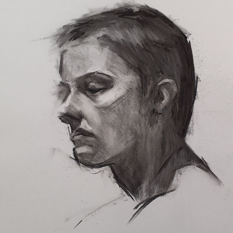 I used vine charcoal and charcoal pencils in this piece