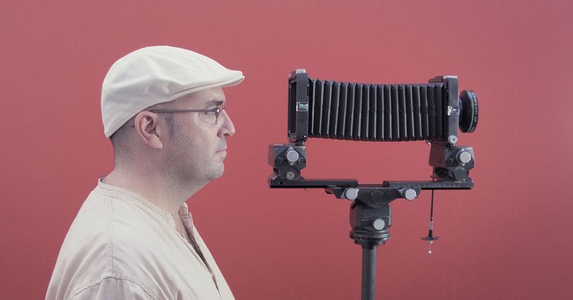 Jesús Granada with a large-format camera.