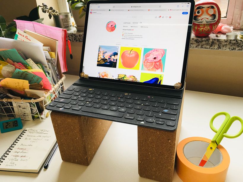I use Yoga blocks to elevate my screen to eye level, it keeps me from hunching over so much!