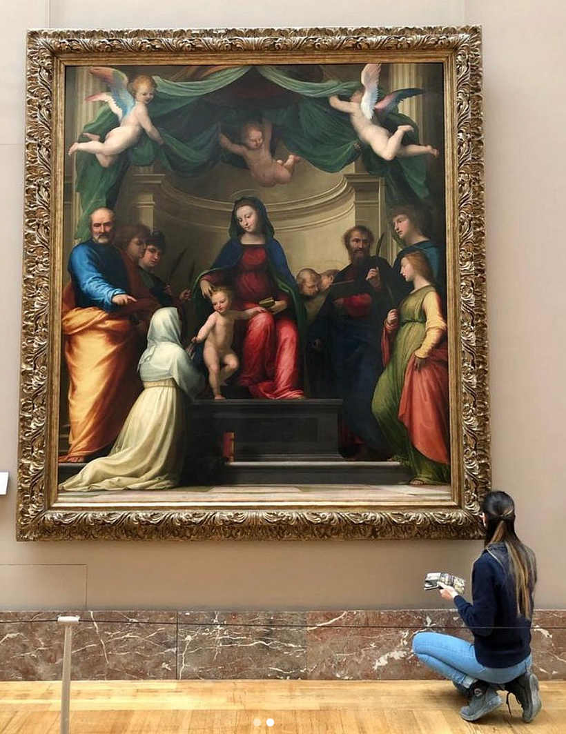 Restauradores do museu. Imagem de @museelouvre