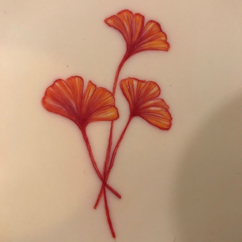 Segundo en piel sintética, 7 cms. Colores rojo, amarillo y blanco.