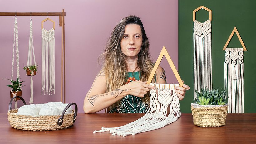 Natalia Corbi specializes in creating macramé pieces using natural fibers and materials.