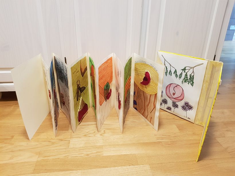 concertina side B: an illustrated story with hand embroidery