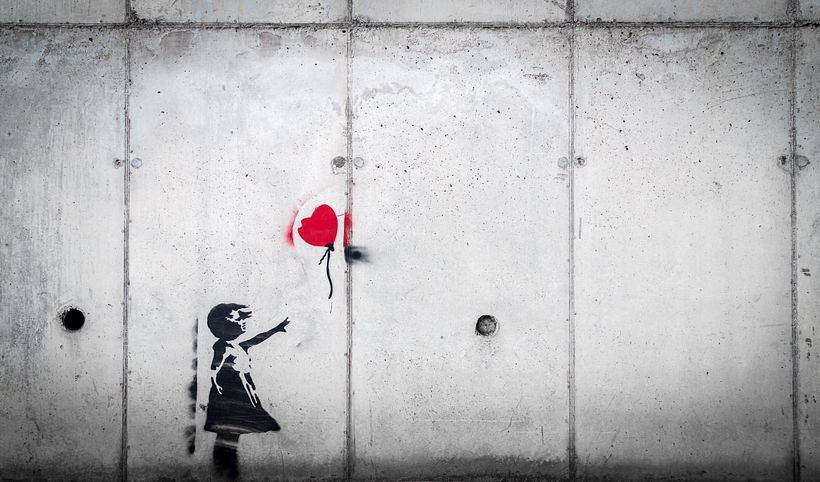 “Girl with Balloon” by Banksy.