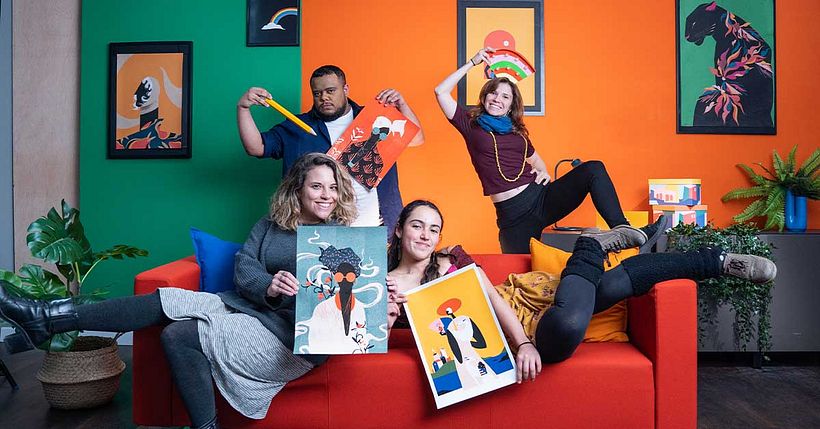 Members of the film crew pose with Willian Santiago in the Domestika studio.