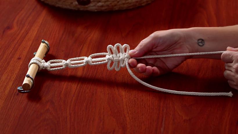 Push the knots up to achieve a different design.